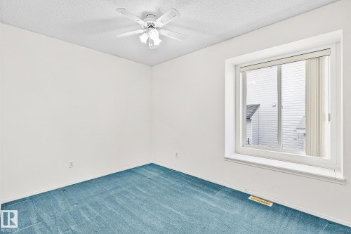 2 Creekside Way, Spruce Grove, AB - Indoor Photo Showing Other Room