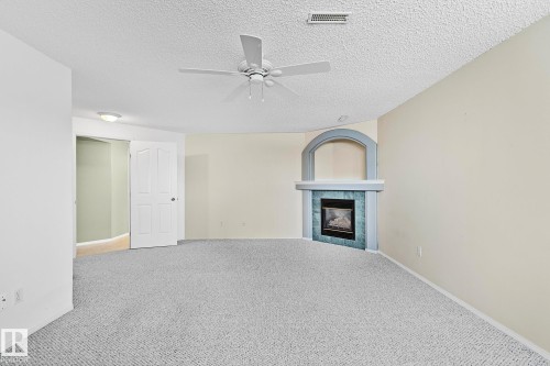 2 Creekside Way, Spruce Grove, AB - Indoor With Fireplace