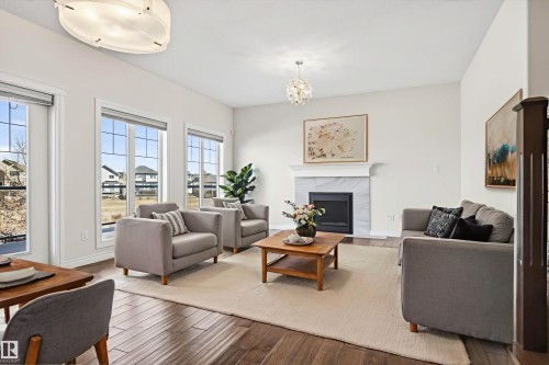15856 13 Avenue, Edmonton, AB - Indoor Photo Showing Living Room With Fireplace