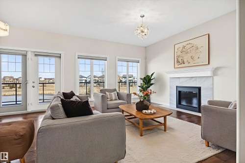 15856 13 Avenue, Edmonton, AB - Indoor Photo Showing Living Room With Fireplace