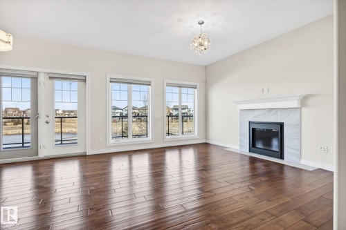 15856 13 Avenue, Edmonton, AB - Indoor Photo Showing Living Room With Fireplace