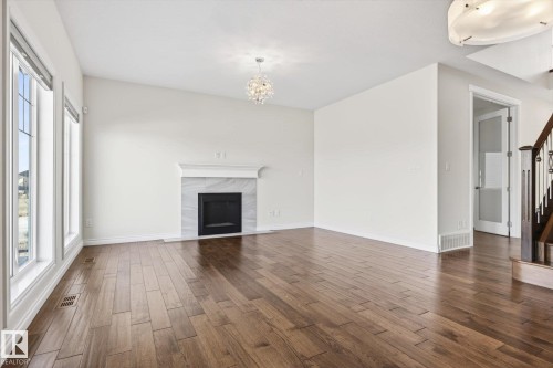15856 13 Avenue, Edmonton, AB - Indoor Photo Showing Living Room With Fireplace