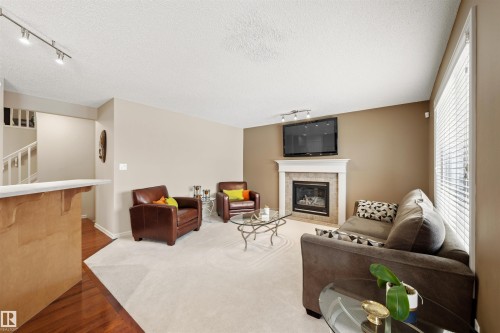 304 79 Street, Edmonton, AB - Indoor Photo Showing Living Room With Fireplace