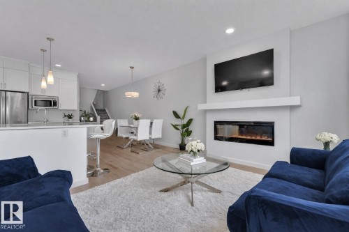 3861 Chrustawka Place, Edmonton, AB - Indoor Photo Showing Living Room With Fireplace