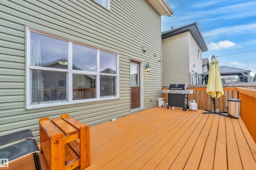 This property features a spacious wooden deck, ideal for outdoor enjoyment - 607 Allard Boulevard, Edmonton, AB - Outdoor With Exterior
