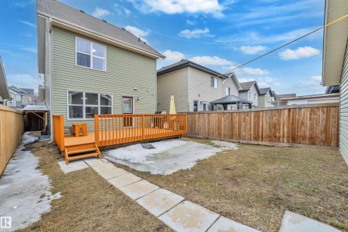 The property features a spacious wooden deck and a fenced yard - 607 Allard Boulevard, Edmonton, AB - Outdoor With Exterior