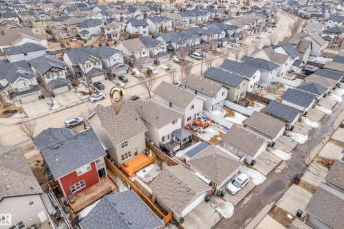 Aerial view of the property and the surrounding neighborhood, featuring residential homes with pitched roofs and paved streets - 607 Allard Boulevard, Edmonton, AB - 
