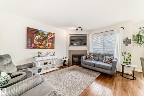 2 Hartwick Loop, Spruce Grove, AB - Indoor Photo Showing Living Room With Fireplace