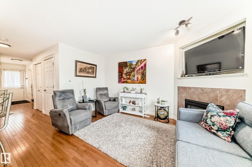 2 Hartwick Loop, Spruce Grove, AB - Indoor Photo Showing Living Room With Fireplace