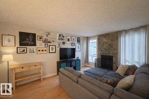 18607 66 Avenue Nw, Edmonton, AB - Indoor Photo Showing Living Room With Fireplace