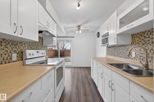 E 16315 89 Avenue, Edmonton, AB - Indoor Photo Showing Kitchen With Double Sink