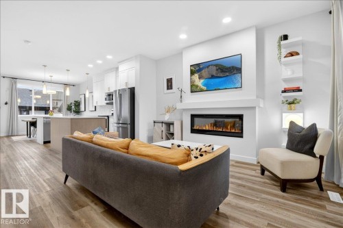 535 Paterson Way, Edmonton, AB - Indoor Photo Showing Living Room With Fireplace