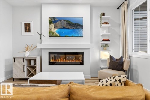 535 Paterson Way, Edmonton, AB - Indoor Photo Showing Living Room With Fireplace