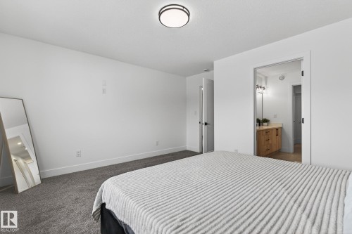127 Hilton Cove, Spruce Grove, AB - Indoor Photo Showing Bedroom