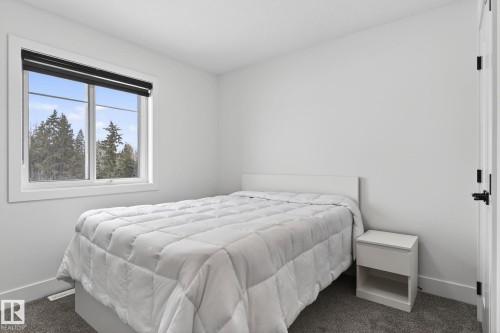 127 Hilton Cove, Spruce Grove, AB - Indoor Photo Showing Bedroom