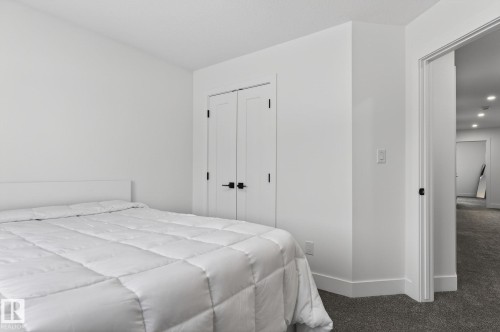 127 Hilton Cove, Spruce Grove, AB - Indoor Photo Showing Bedroom