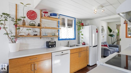 36 10453 20 Avenue, Edmonton, AB - Indoor Photo Showing Kitchen With Double Sink