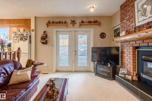 45 Wimbleton Crescent, St. Albert, AB - Indoor Photo Showing Living Room With Fireplace