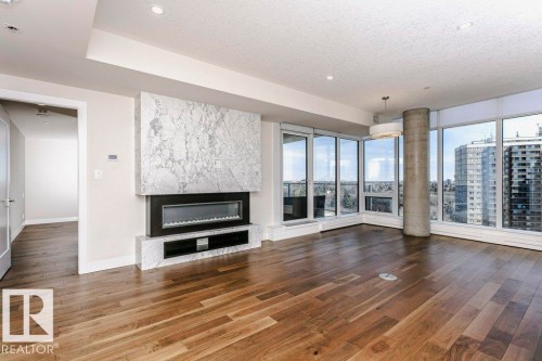 904 14105 West Block Drive, Edmonton, AB - Indoor Photo Showing Living Room With Fireplace