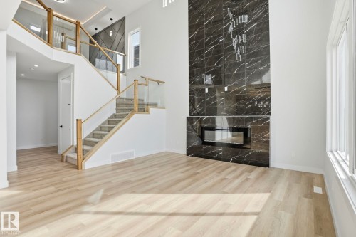 6716 Knox Crest Sw, Edmonton, AB - Indoor Photo Showing Other Room With Fireplace