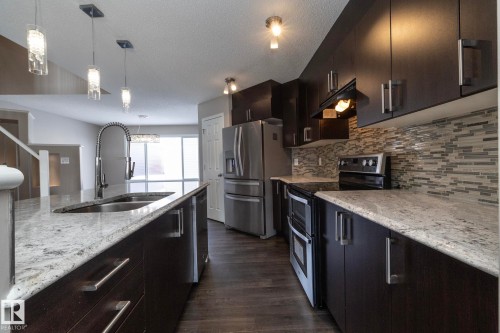 6938 23 Avenue, Edmonton, AB - Indoor Photo Showing Kitchen With Double Sink With Upgraded Kitchen