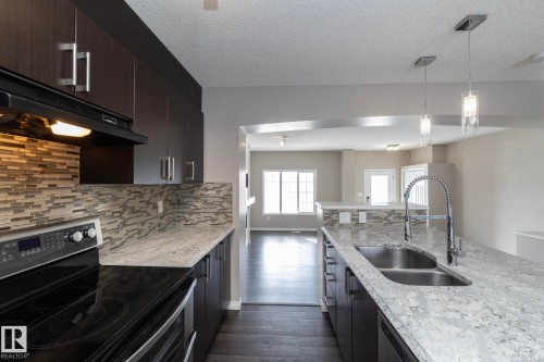 6938 23 Avenue, Edmonton, AB - Indoor Photo Showing Kitchen With Double Sink With Upgraded Kitchen