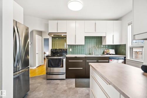 13519 110 A Avenue, Edmonton, AB - Indoor Photo Showing Kitchen With Double Sink