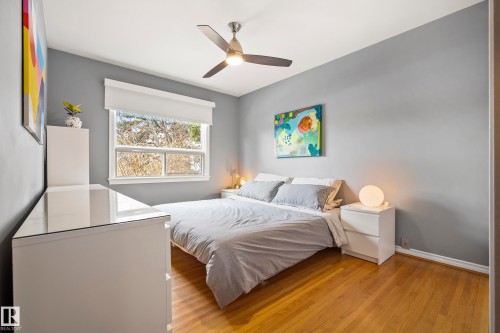 Main floor bedroom, can be used for primary or an additional room - 13519 110 A Avenue, Edmonton, AB - Indoor Photo Showing Bedroom