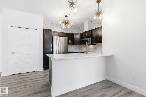 105 304 Ambleside Link Link, Edmonton, AB - Indoor Photo Showing Kitchen With Upgraded Kitchen