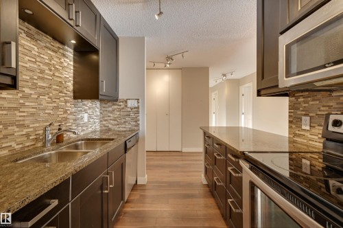 406 12141 Jasper Avenue, Edmonton, AB - Indoor Photo Showing Kitchen With Double Sink With Upgraded Kitchen