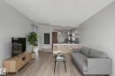 The living area features light-toned flooring and neutral wall tones - 5920 132 Avenue, Edmonton, AB  - Indoor Photo Showing Living Room 