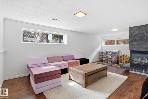 4111 121 Street, Edmonton, AB - Indoor Photo Showing Living Room With Fireplace