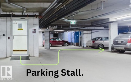 Underground parking garage with concrete walls and ceiling - 209 14612 125 Street, Edmonton, AB - Indoor Photo Showing Garage