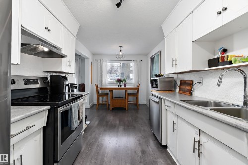 9326 80 Avenue, Edmonton, AB - Indoor Photo Showing Kitchen With Double Sink