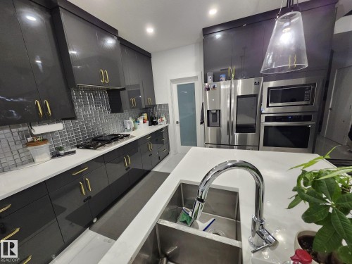 5306 Rue Eaglemont, Beaumont, AB - Indoor Photo Showing Kitchen With Upgraded Kitchen