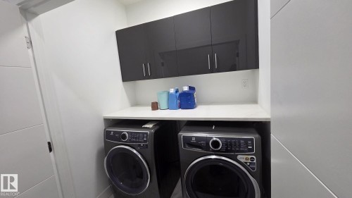 5306 Rue Eaglemont, Beaumont, AB - Indoor Photo Showing Laundry Room