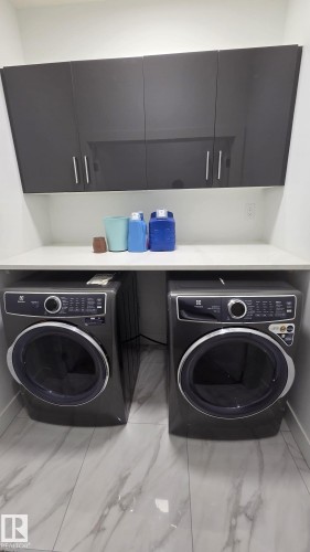 5306 Rue Eaglemont, Beaumont, AB - Indoor Photo Showing Laundry Room