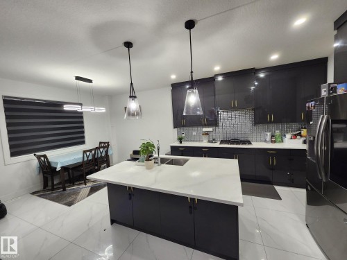 5306 Rue Eaglemont, Beaumont, AB - Indoor Photo Showing Kitchen With Upgraded Kitchen