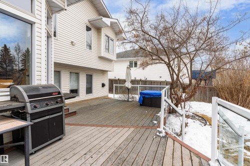 Expansive rear deck featuring glass panel railings - 10 Harmony Place, St. Albert, AB - Outdoor With Deck Patio Veranda With Exterior