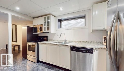 1315 Westerra Drive, Stony Plain, AB - Indoor Photo Showing Kitchen With Double Sink