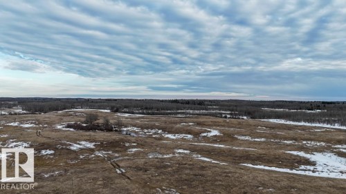 Expansive open land with varied terrain and distant tree lines - 57027 Sec Hwy 881, Rural St. Paul County, AB 