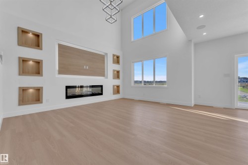 176 Caledon Crescent, Spruce Grove, AB - Indoor Photo Showing Other Room With Fireplace