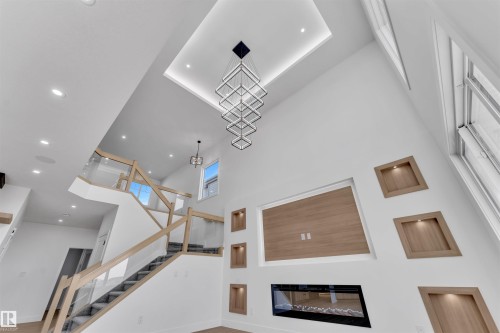 176 Caledon Crescent, Spruce Grove, AB - Indoor Photo Showing Other Room With Fireplace