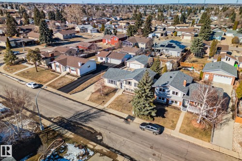 Aerial view of the neighborhood showcasing residential properties with established trees and paved streets - 2016 138 Avenue, Edmonton, AB - Outdoor With View