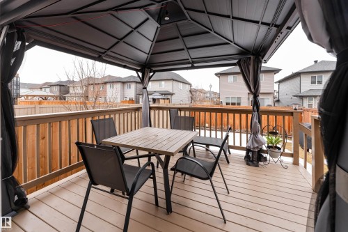 Outdoor deck featuring a wood railing and a covered gazebo - 22742 95A Ave, Edmonton, AB - Outdoor With Deck Patio Veranda With Exterior