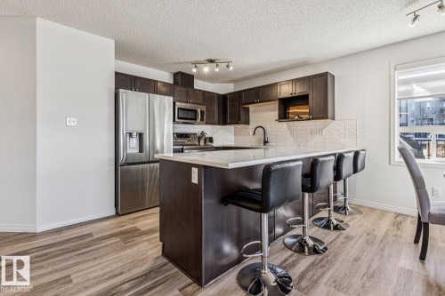 147 1520 Hammond Gate Gate, Edmonton, AB - Indoor Photo Showing Kitchen With Stainless Steel Kitchen With Upgraded Kitchen