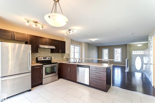 27 1623 Towne Centre Boulevard, Edmonton, AB - Indoor Photo Showing Kitchen With Stainless Steel Kitchen With Double Sink