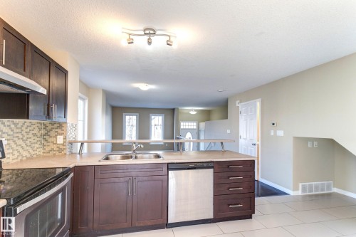 27 1623 Towne Centre Boulevard, Edmonton, AB - Indoor Photo Showing Kitchen With Double Sink