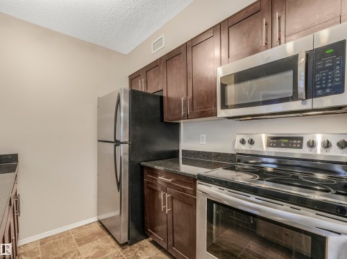 116 530 Watt Boulevard, Edmonton, AB - Indoor Photo Showing Kitchen With Stainless Steel Kitchen