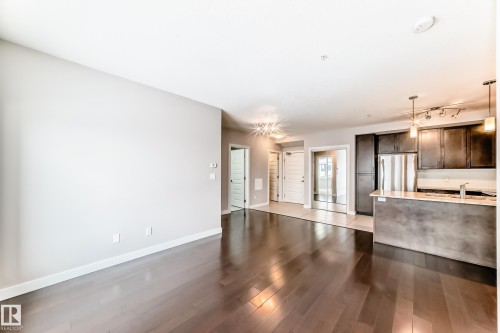 711 5151 Windermere Boulevard, Edmonton, AB - Indoor Photo Showing Kitchen